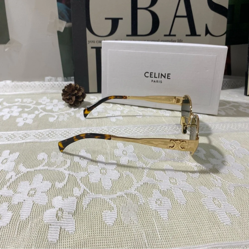 CELINE Gold Frame Oval Sunglasses with Green Lenses
